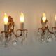 Pair of antique 2-light wall sconces in bronze with crystal pendants, Spain.