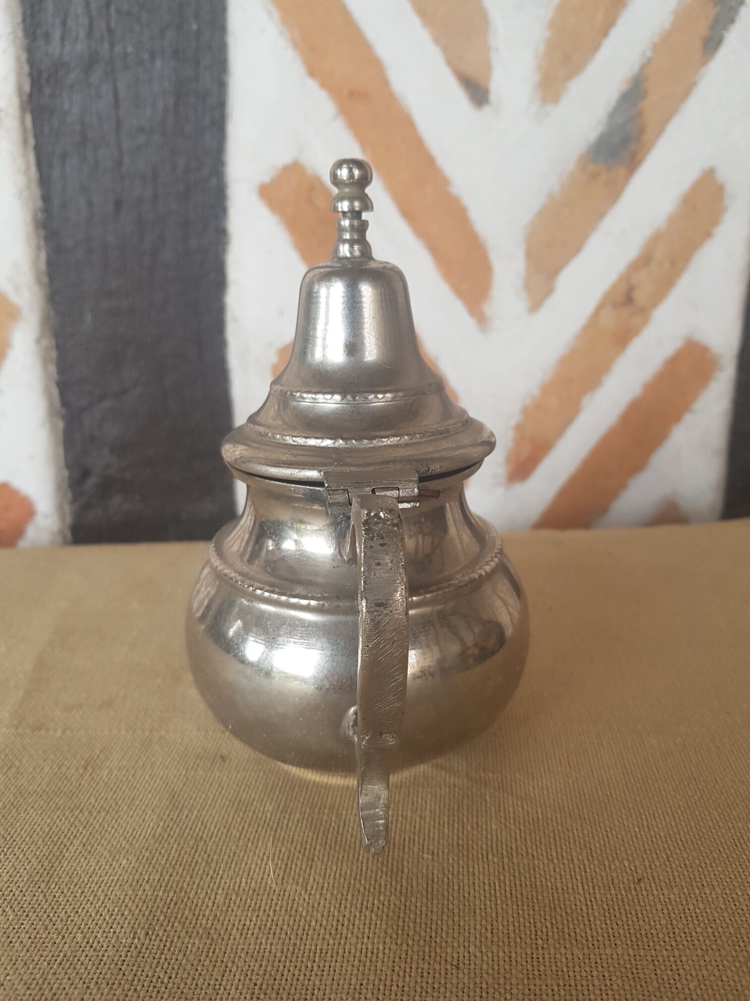 Oriental teapot silver metal