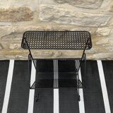 Black perforated metal magazine rack