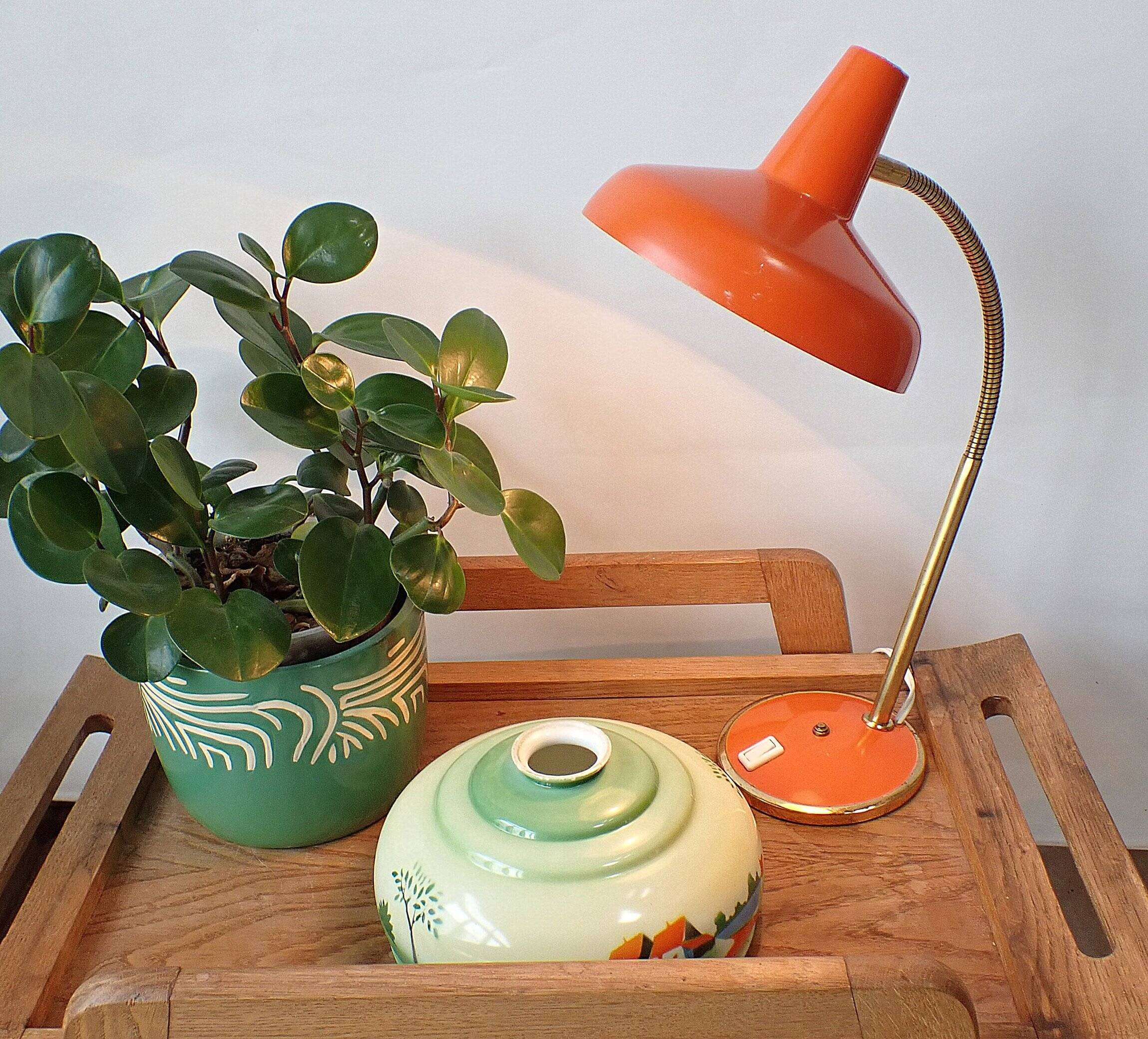 Vintage adjustable lamp, orange, made of metal.