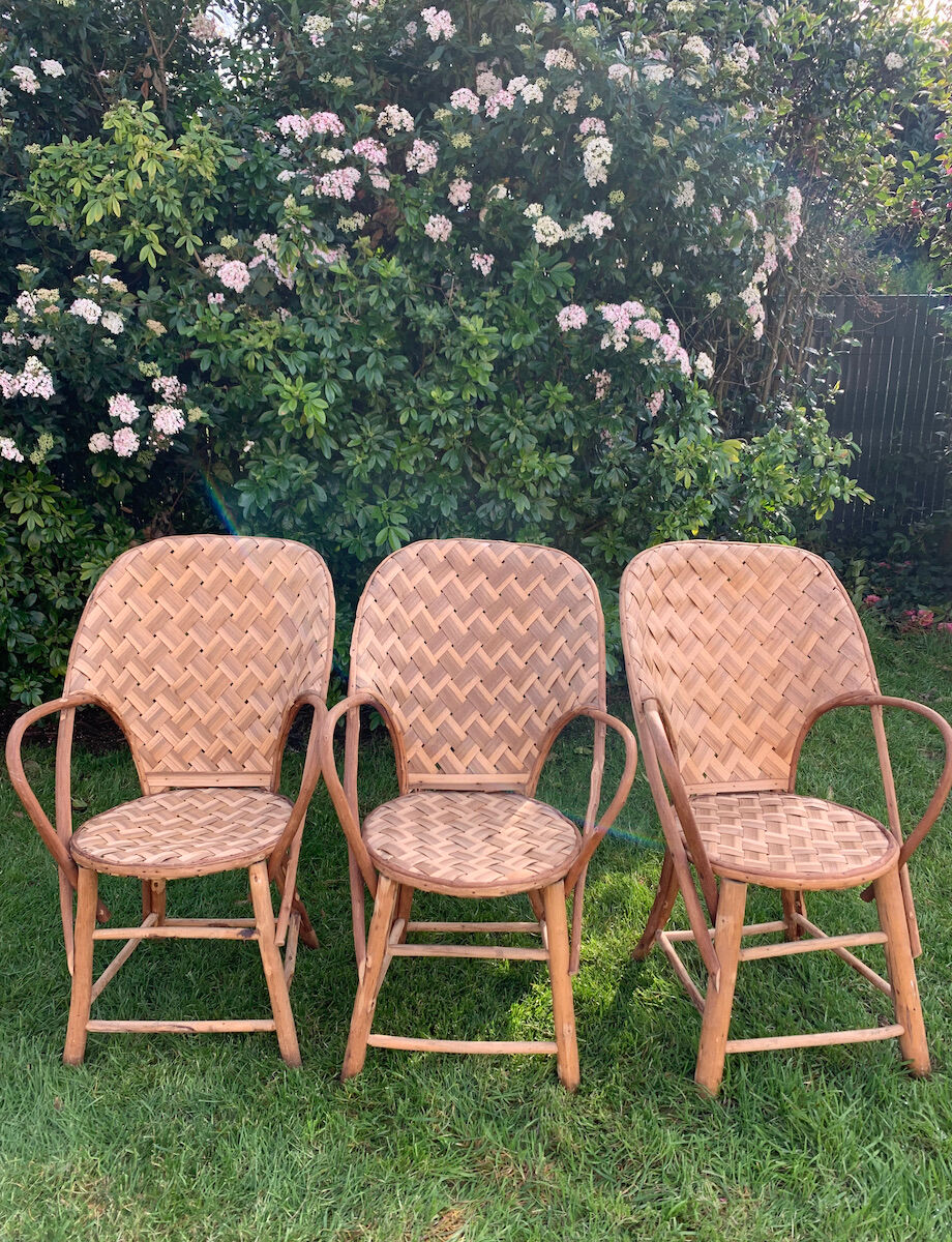 Trio of braided chestnut chairs