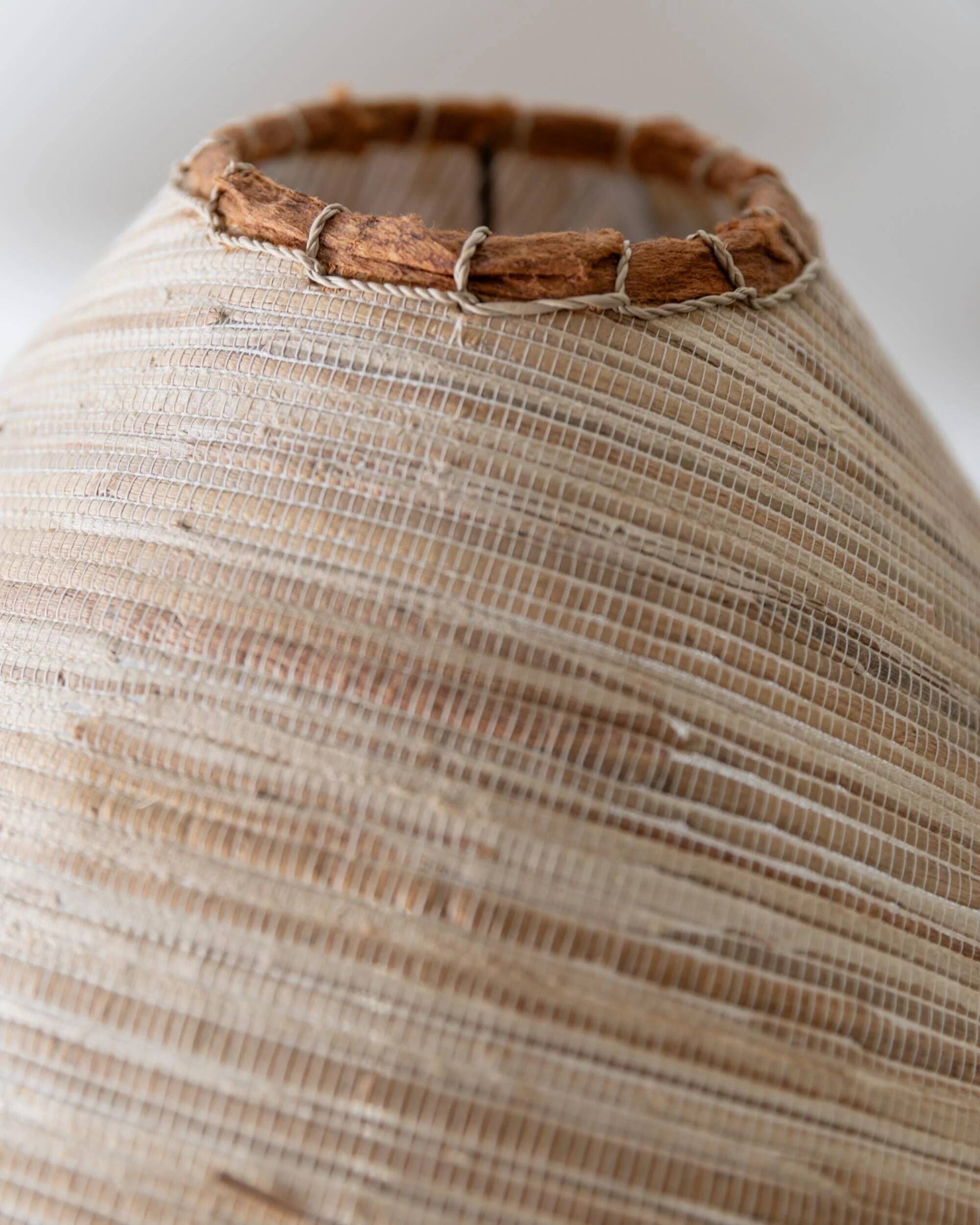 Lot of 2 vintage table lamps from the 1970s, dark wood oval bases with curved brass details, handmade natural fibre lampshades, elegant lighting.