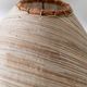 Lot of 2 vintage table lamps from the 1970s, dark wood oval bases with curved brass details, handmade natural fibre lampshades, elegant lighting.
