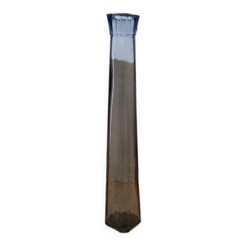 Translucent blue glass vase from the 1980s — tall prismatic silhouette, polygonal base.