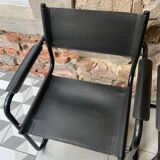 Pair of black armchairs