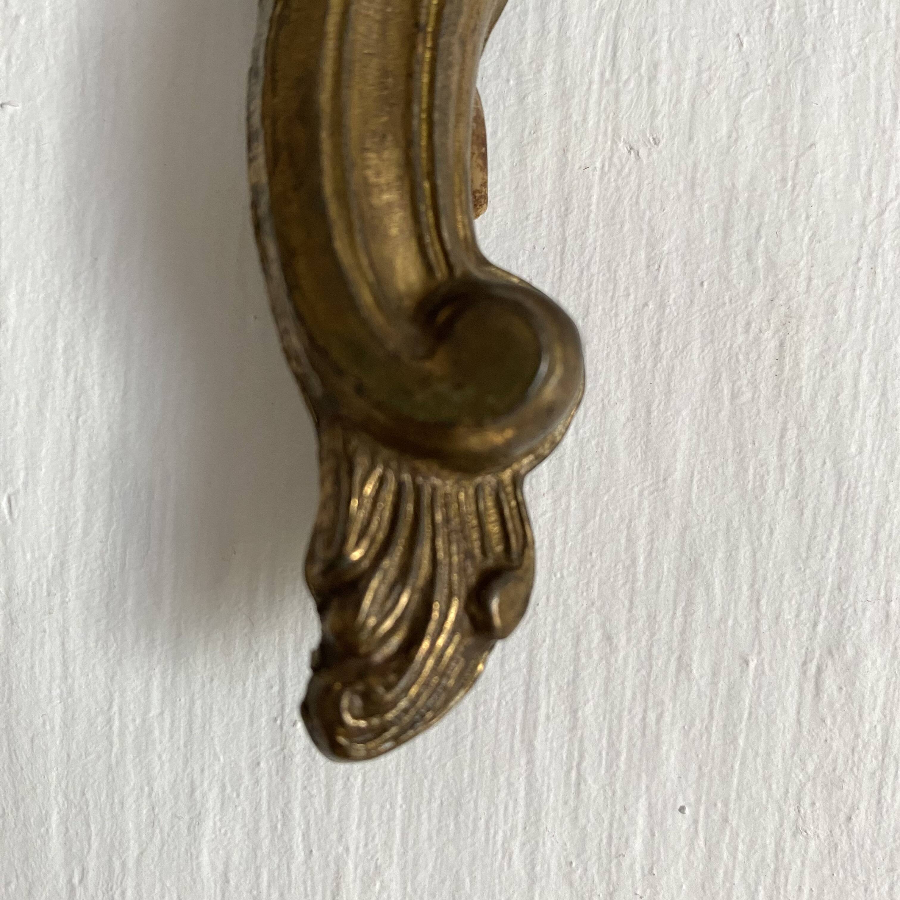 Pair of rocaille style wall lights