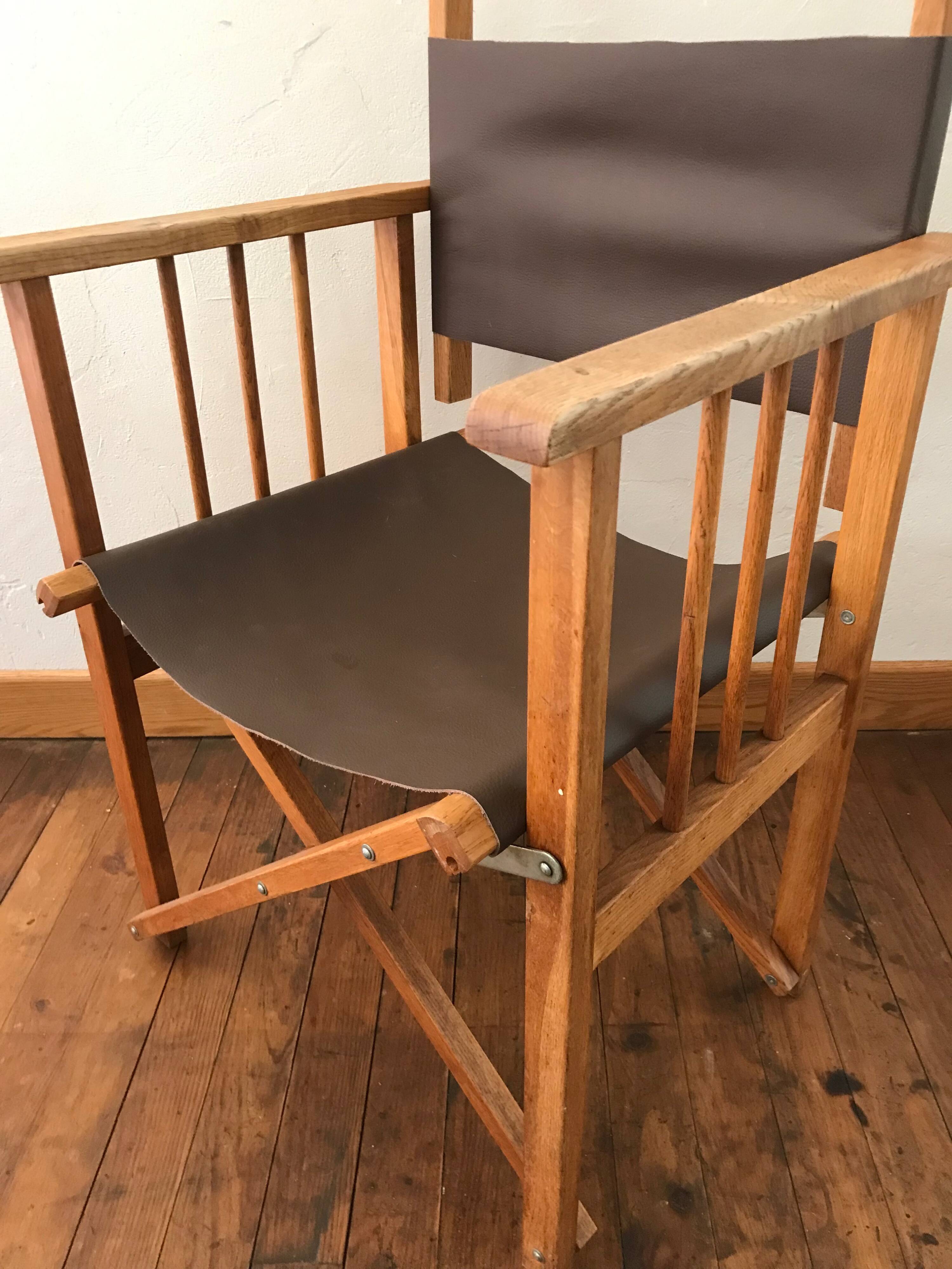 pair of Safari armchairs in wood and leather