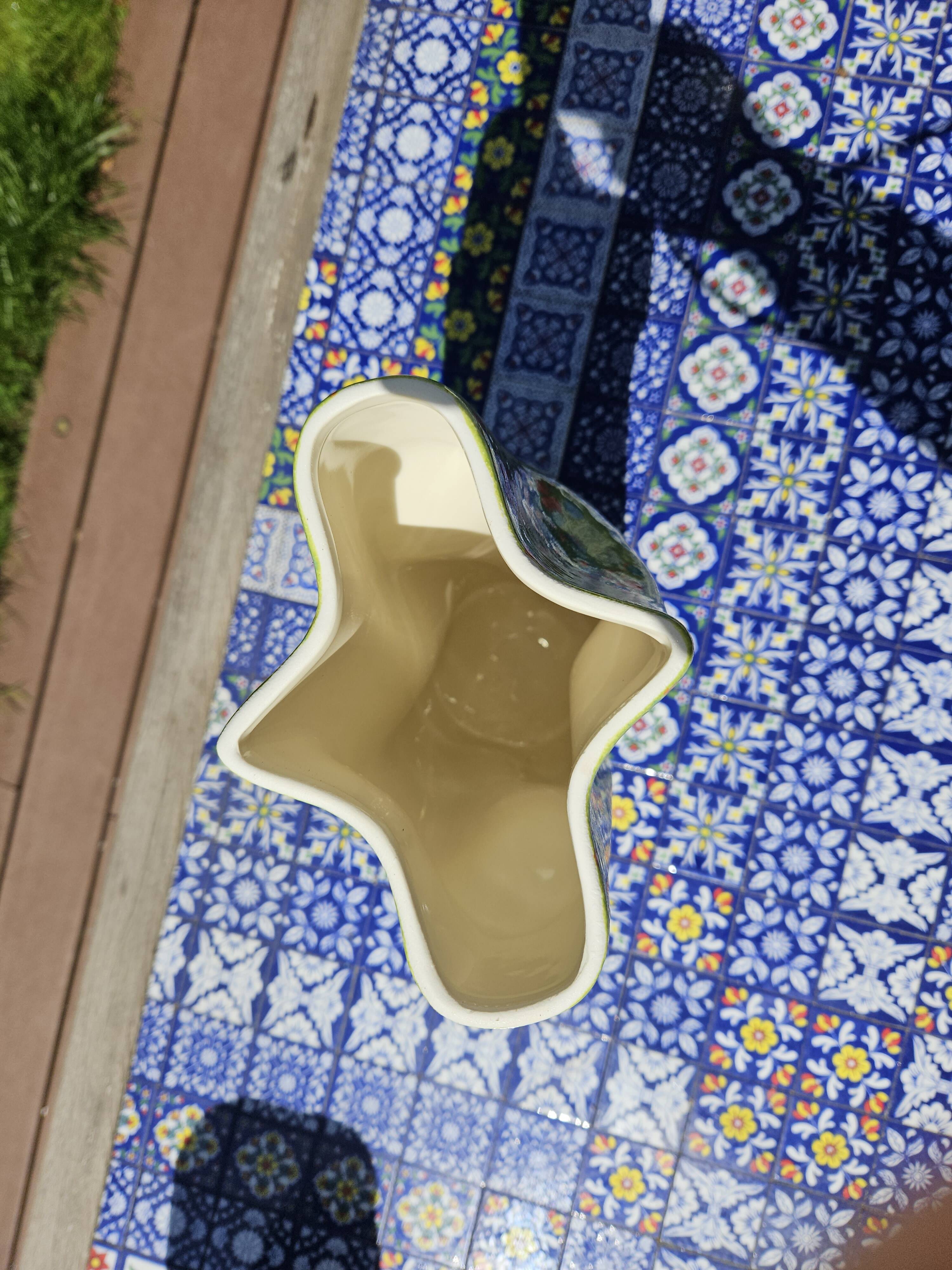 Hand enamelled handkerchief vase