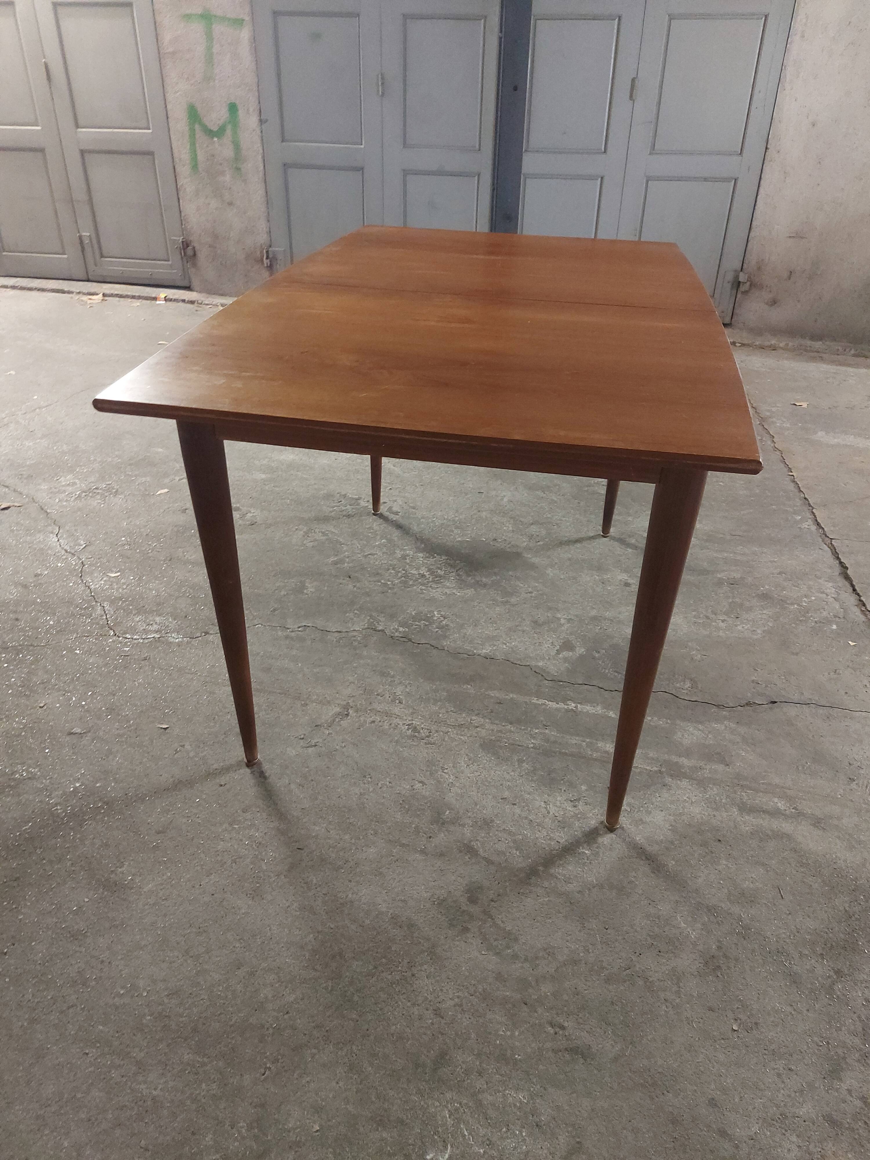 Scandinavian teak table with built-in extension