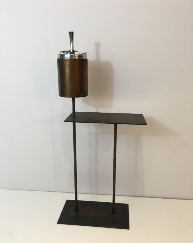 Modernist ashtray in black lacquered metal and brass