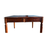 Old table in varnished solid wood