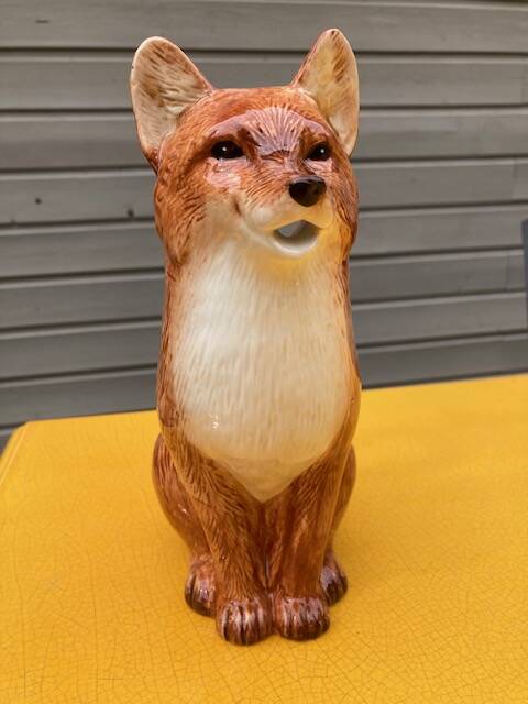 Ceramic jug in the shape of a fox.
