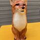 Ceramic jug in the shape of a fox.