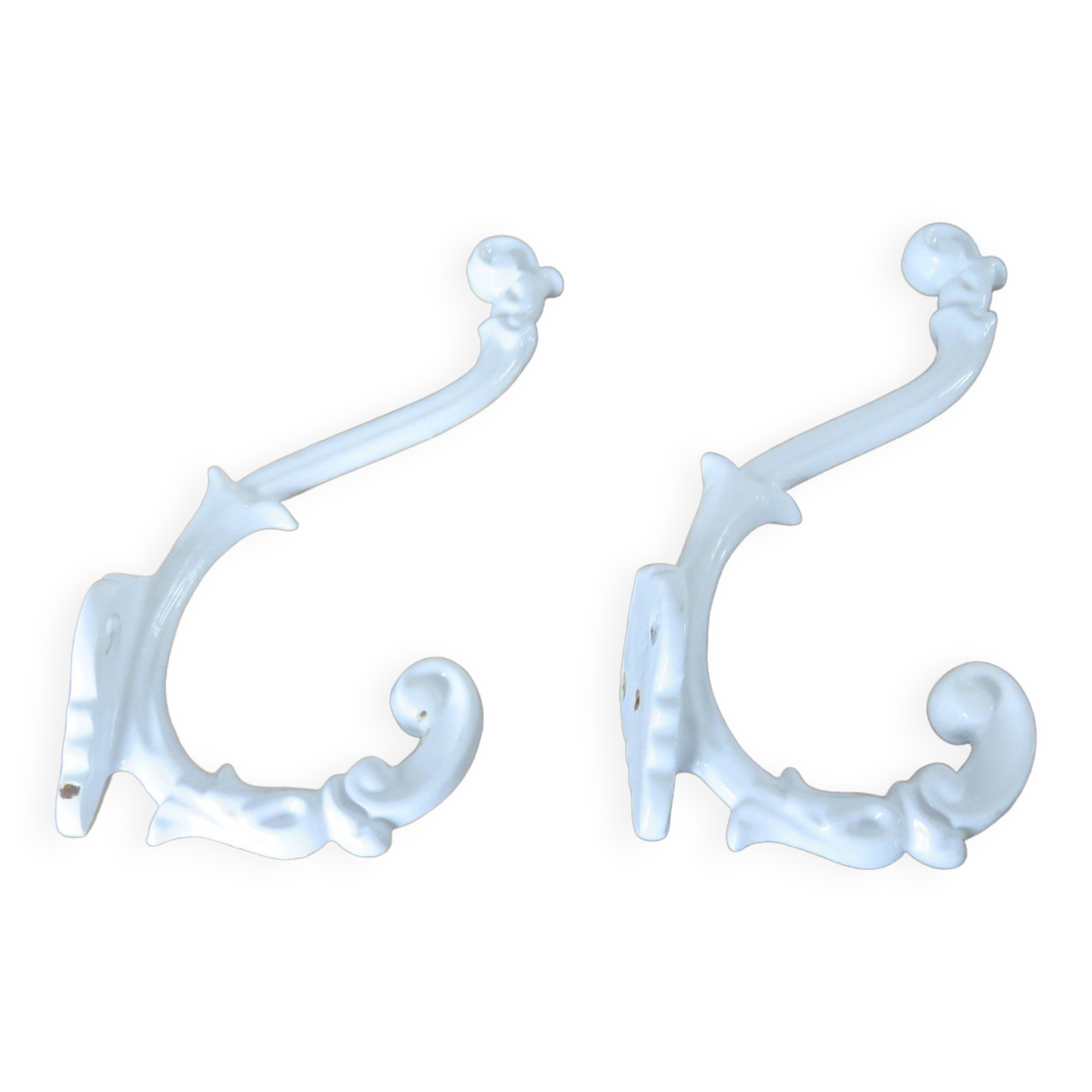 Pair of Art Deco white cast iron coat hooks from the 1930s and 1940s