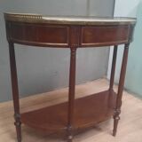 Louis XVI period demi-lune console in mahogany.