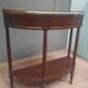 Louis XVI period demi-lune console in mahogany.