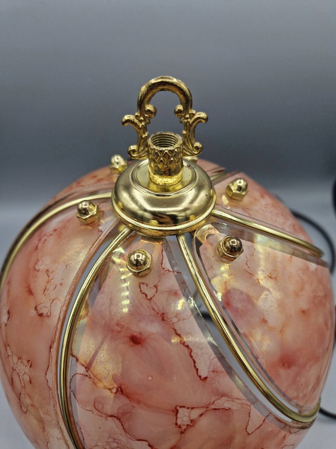 Vintage pink glass globe lamp with brass details and pink base