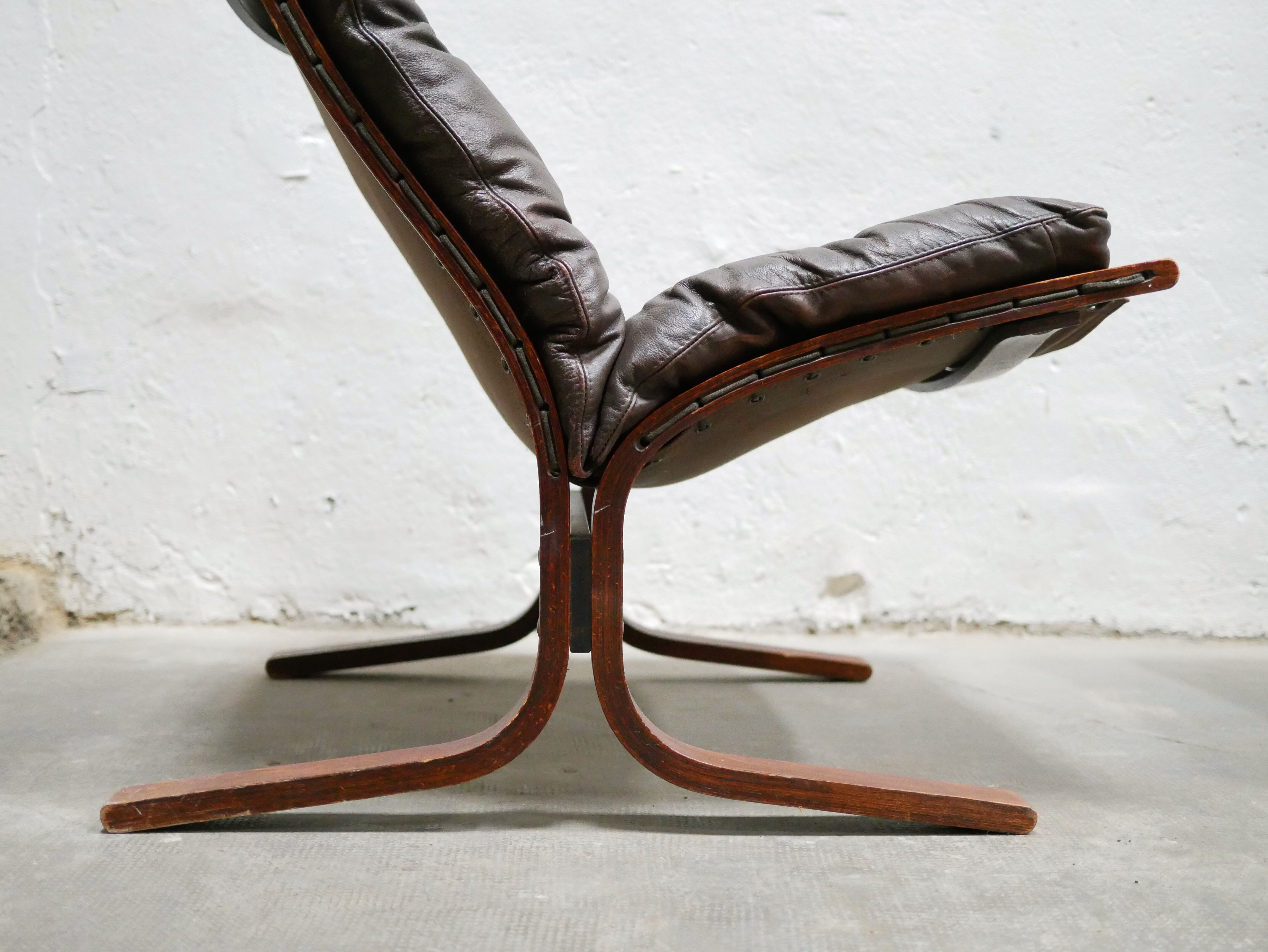 Scandinavian armchair and ottoman Siesta in brown leather by Ingmar Relling for Westnofa editions