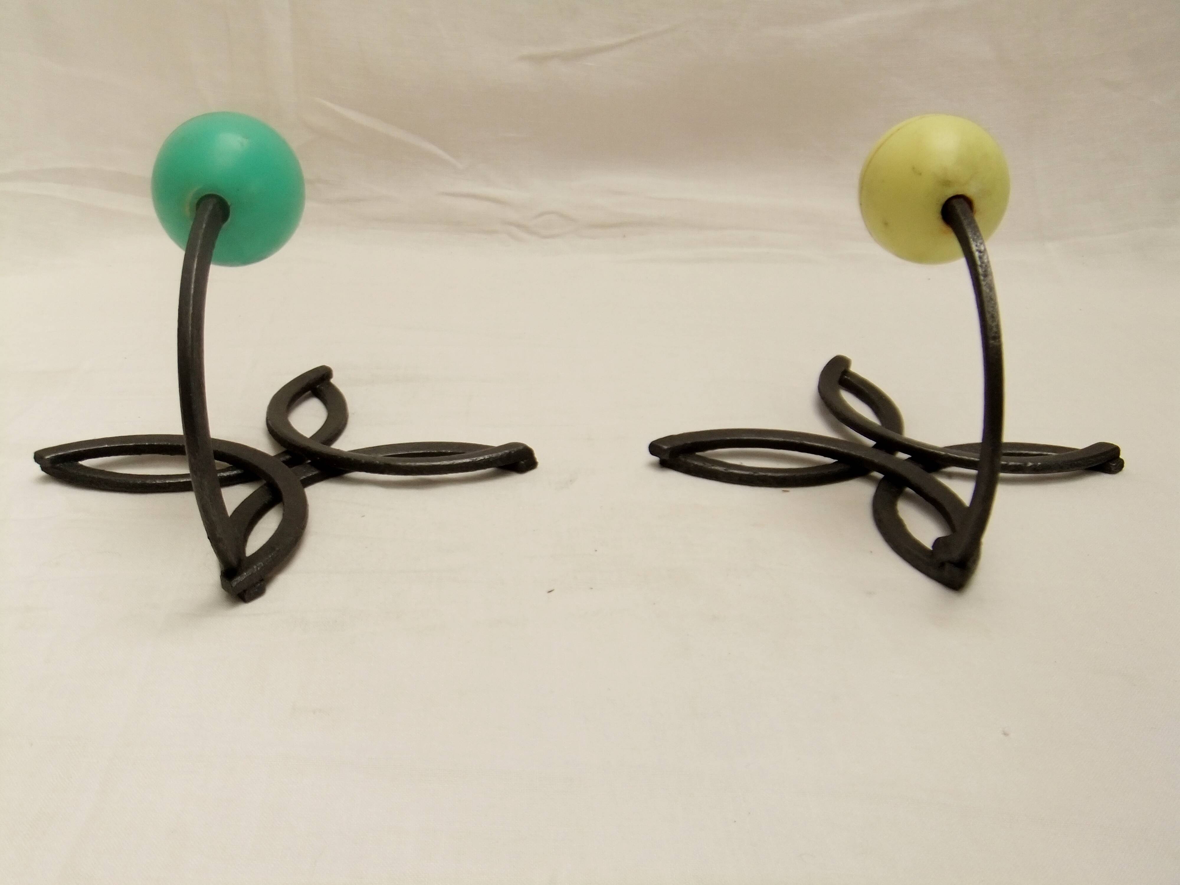 Wrought iron pair coat hook design