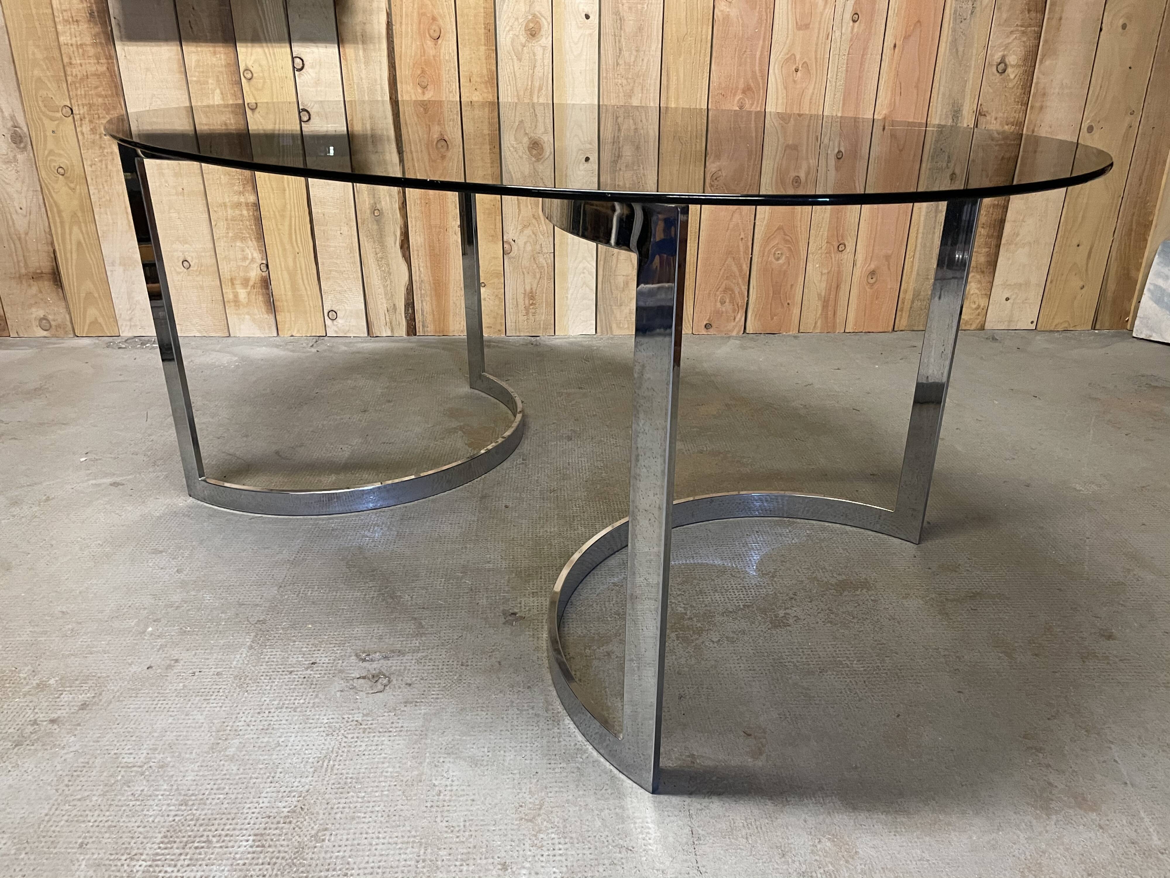 Glass oval dining table by Milo Baughman
