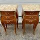 Pair of Louis XV style bedside tables with rosewood marquetry