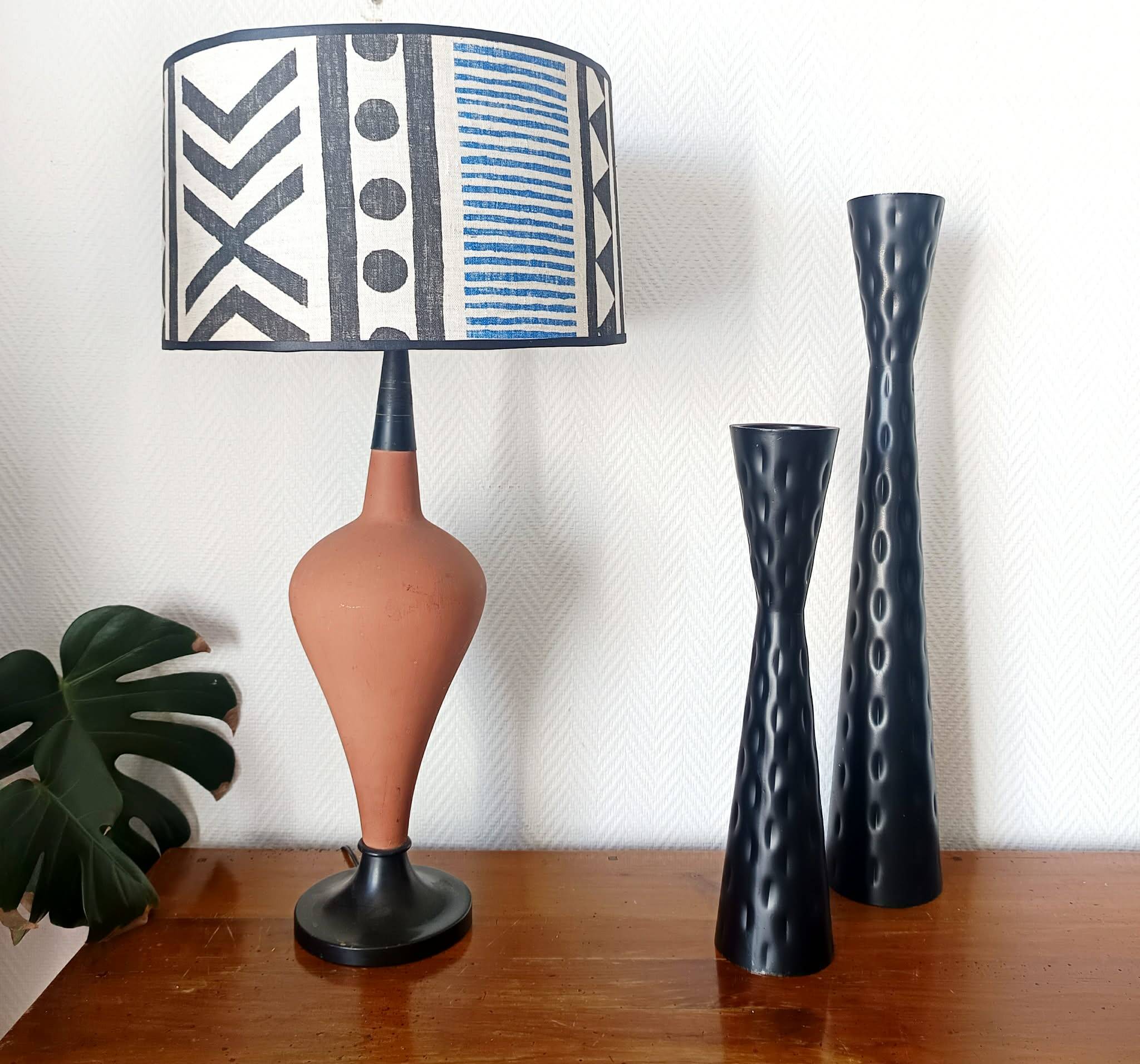 Pair of vintage metal diabolo candlesticks