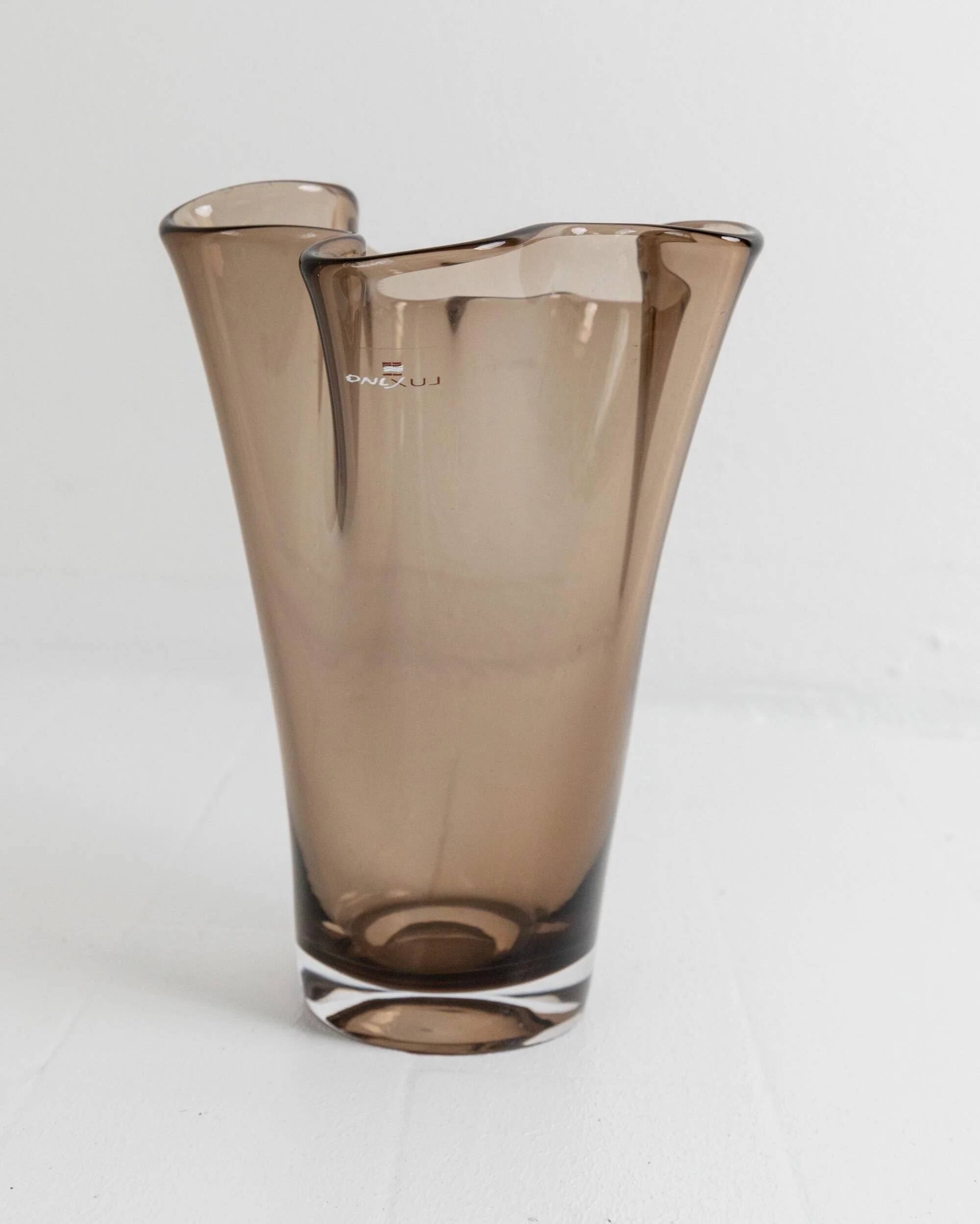 Vintage Murano glass vase from the 1980s, smoky brown, organically wavy shape.