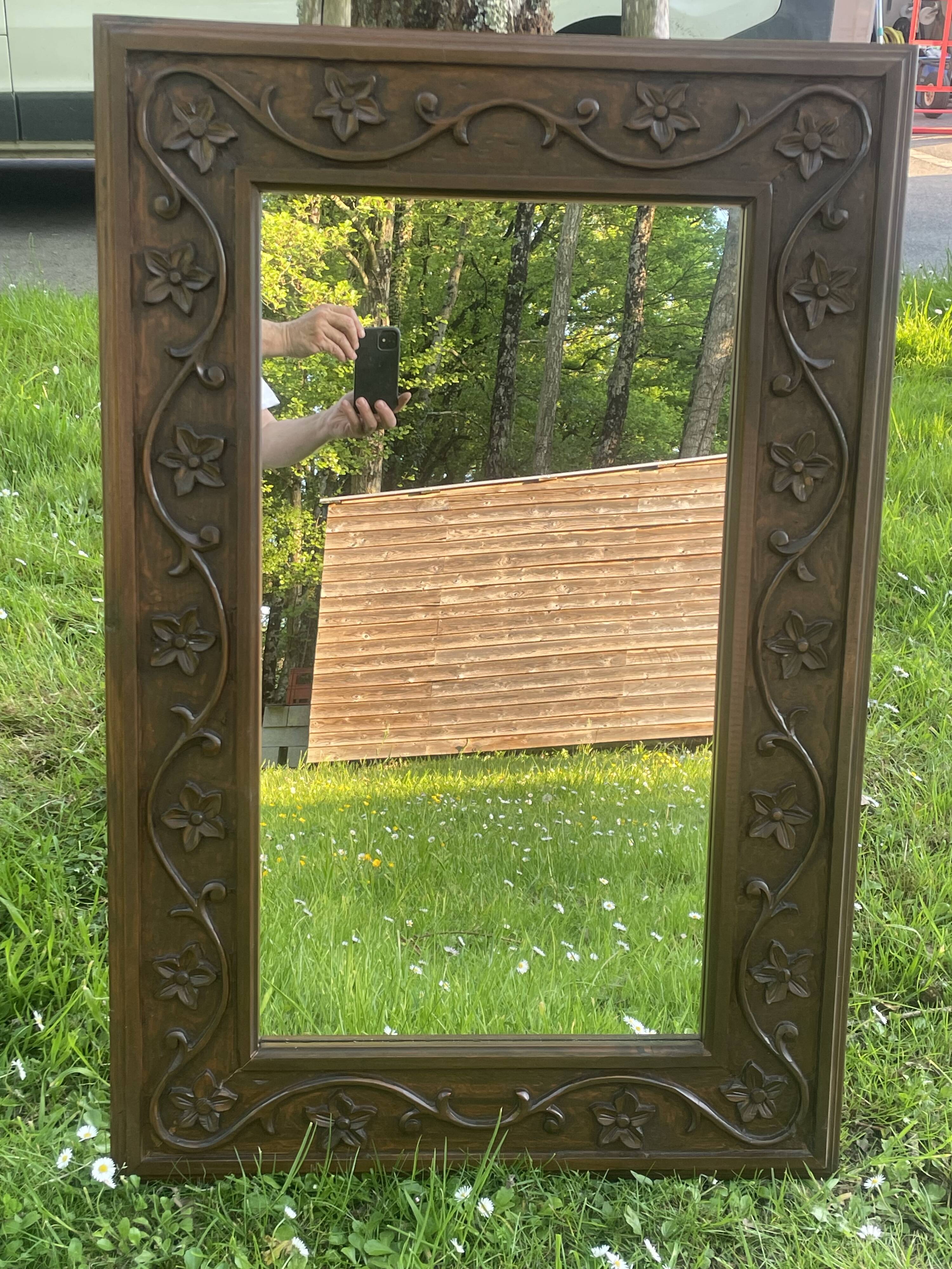 Large carved wooden mirror in Art Nouveau style