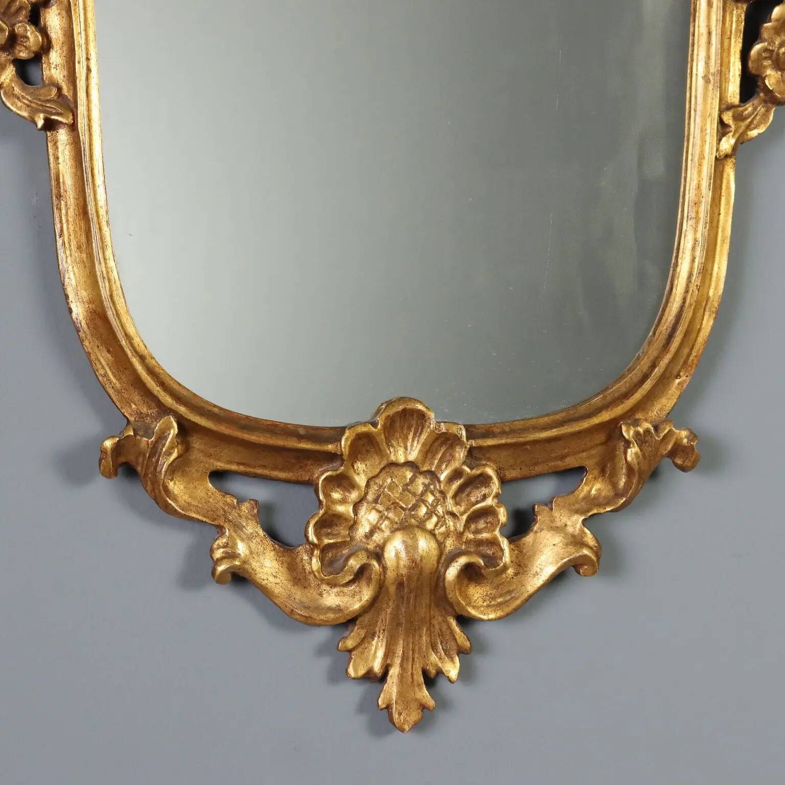 Antique carved and gilded wooden mirror, Italy, late 19th century.