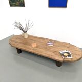 XXL oval coffee table in solid oak, cylindrical base, 1950s.
