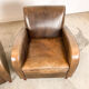Set of two vintage leather wagon wheel armchairs Haarle