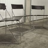 Set of 3 minimalist X line chairs by Niels Jorgen Haugesen.