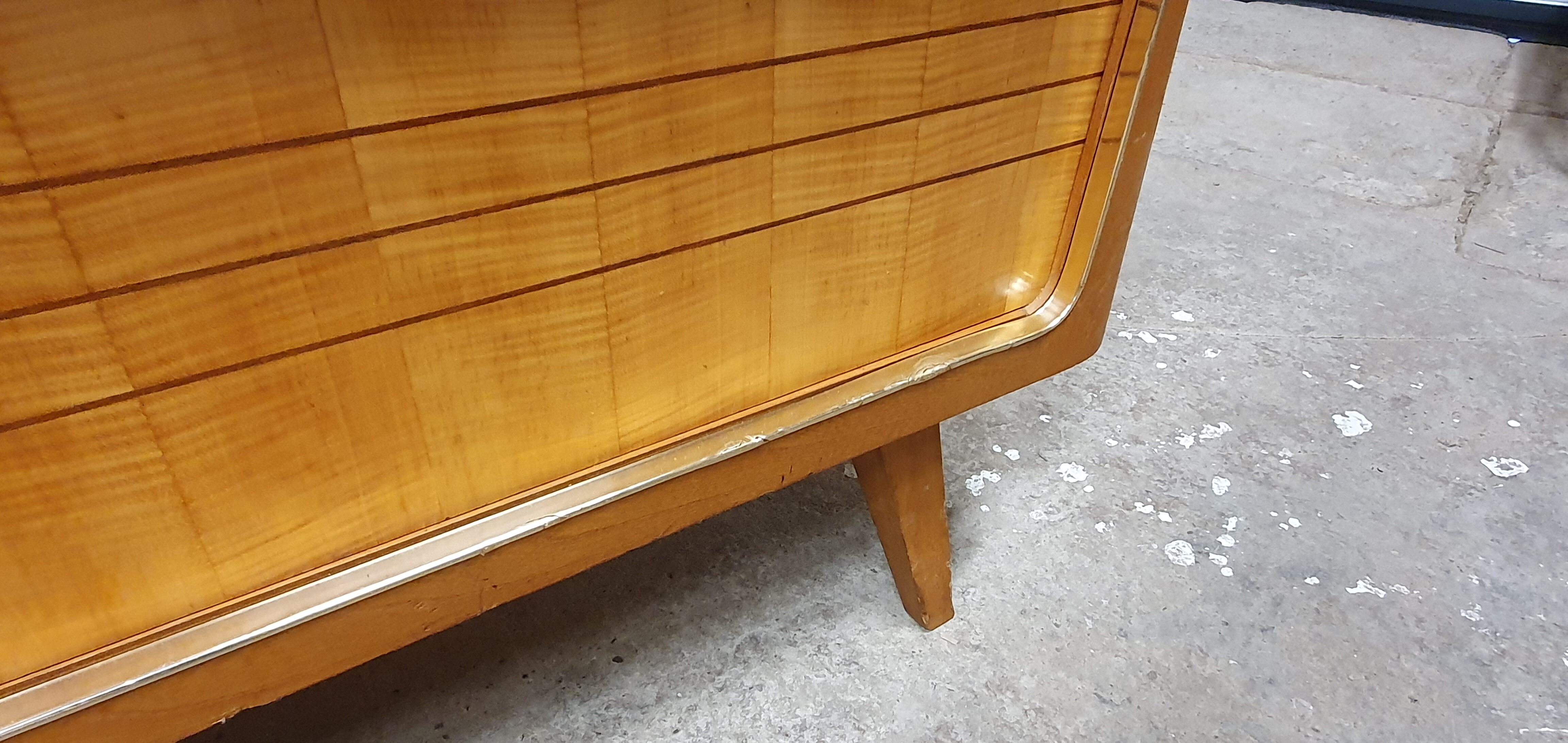 Lowborard row of the 60s"