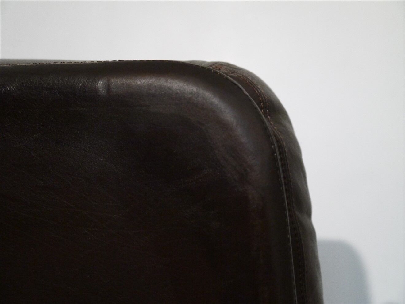 Pair of Scandinavian leather armchairs with ottomans 1970