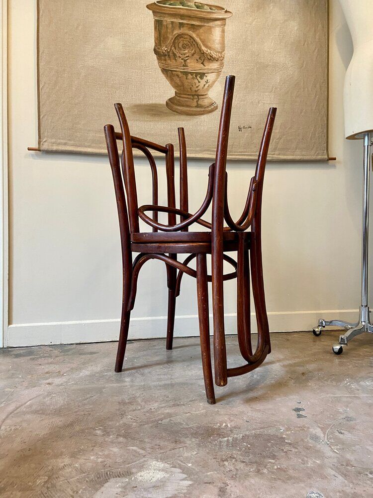 2 bistro chairs in arched and dark wood