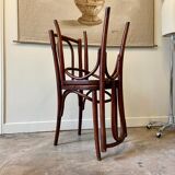2 bistro chairs in arched and dark wood