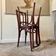 2 bistro chairs in arched and dark wood