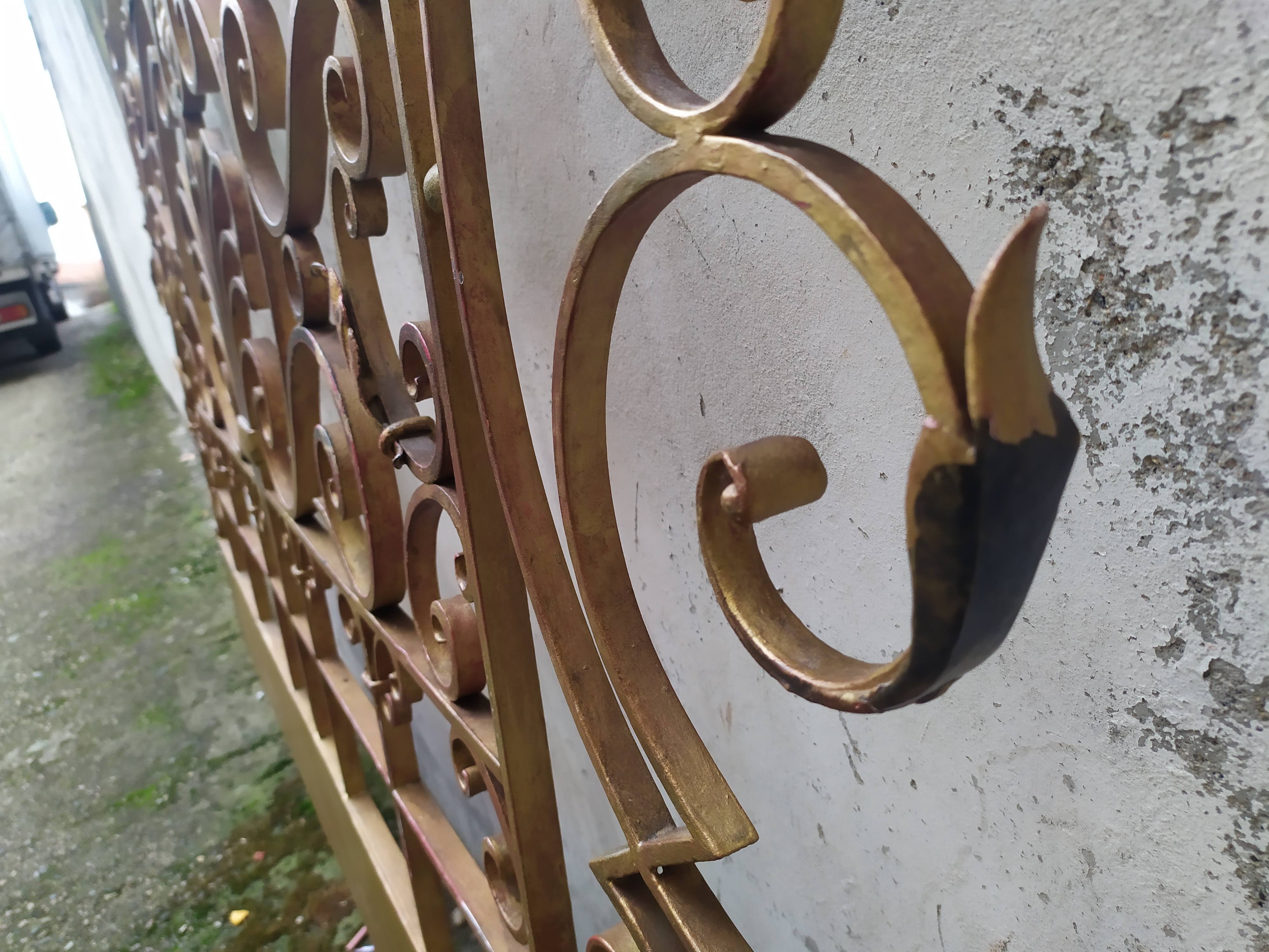 Golden wrought iron bedhead