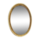 Oval mirror in gilded wood 67X52