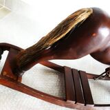 Ancien cheval à bascule en bois et cuir