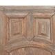 Paneled and carved wooden cupboard door