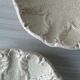 Fluted cracked terracotta dishes - fluted wall plates