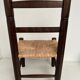 Wooden children's chair with vintage straw seat