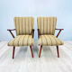 A pair vintage cocktail chairs with stripes and metal screws