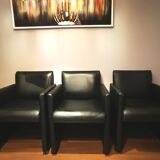 6 faux leather chairs on wheels