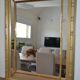 Large mirror with wooden gilded and carved frame.