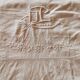Old monogrammed fabric