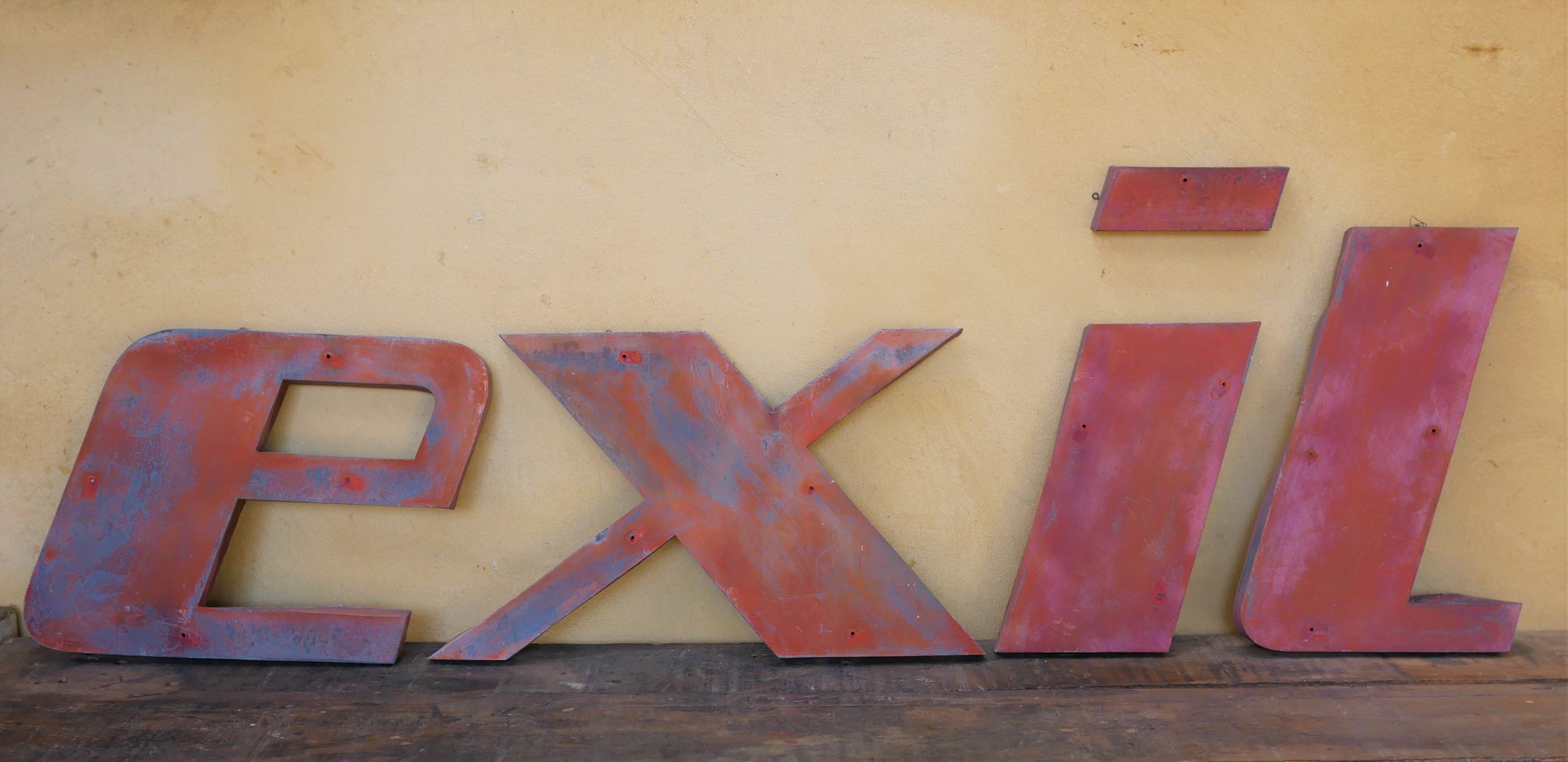 Letter to sign vintage metal "T".