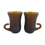 pair of small brown glass cups