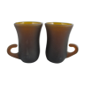 pair of small brown glass cups